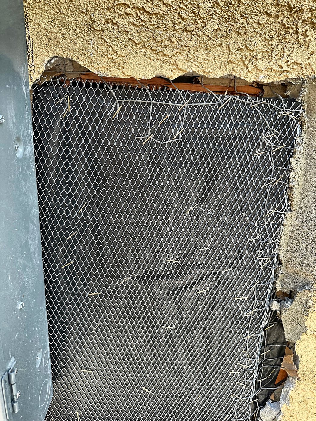 Wire lath installed in the wall opening