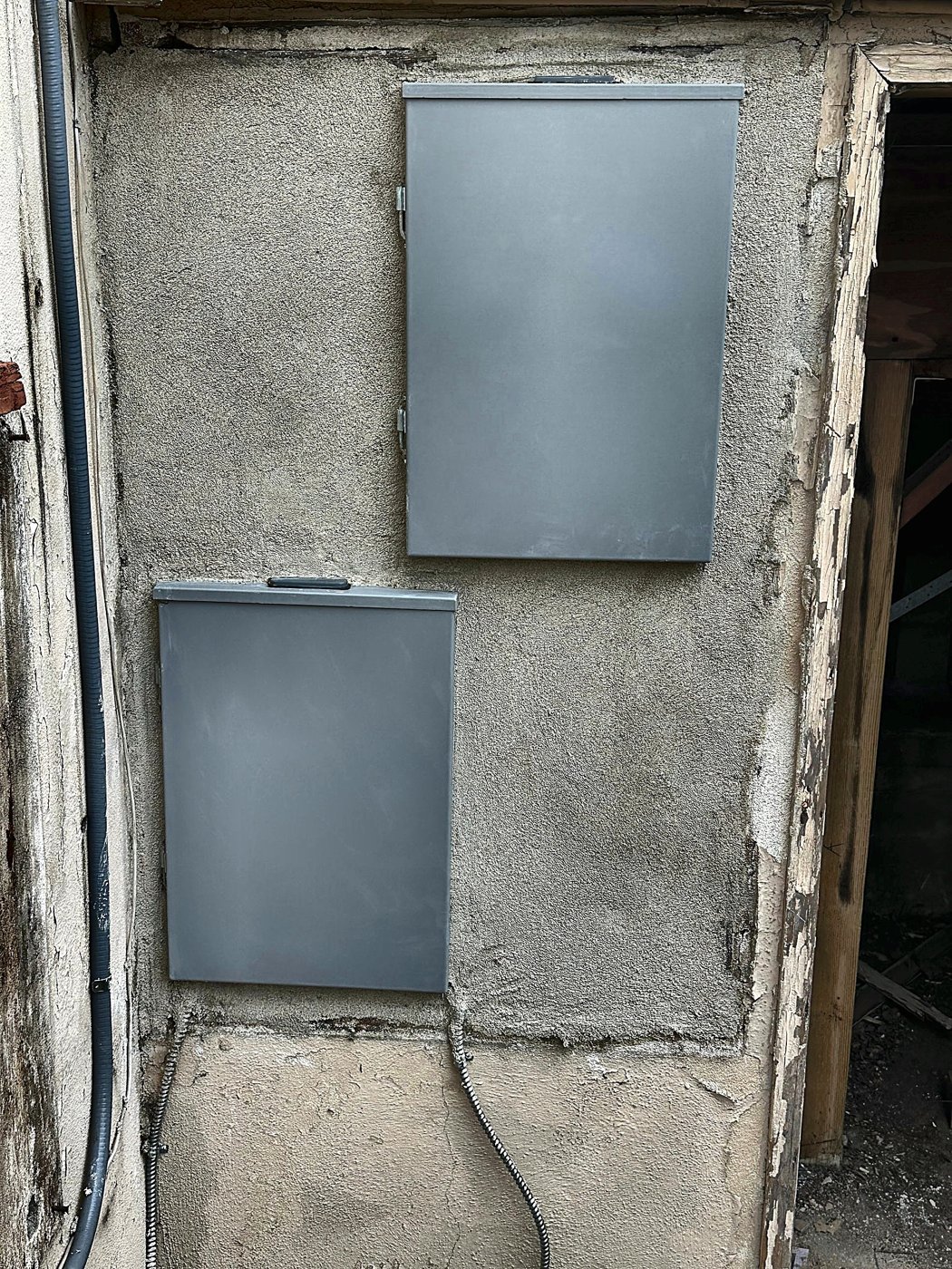 Finished stucco around stairwell panels