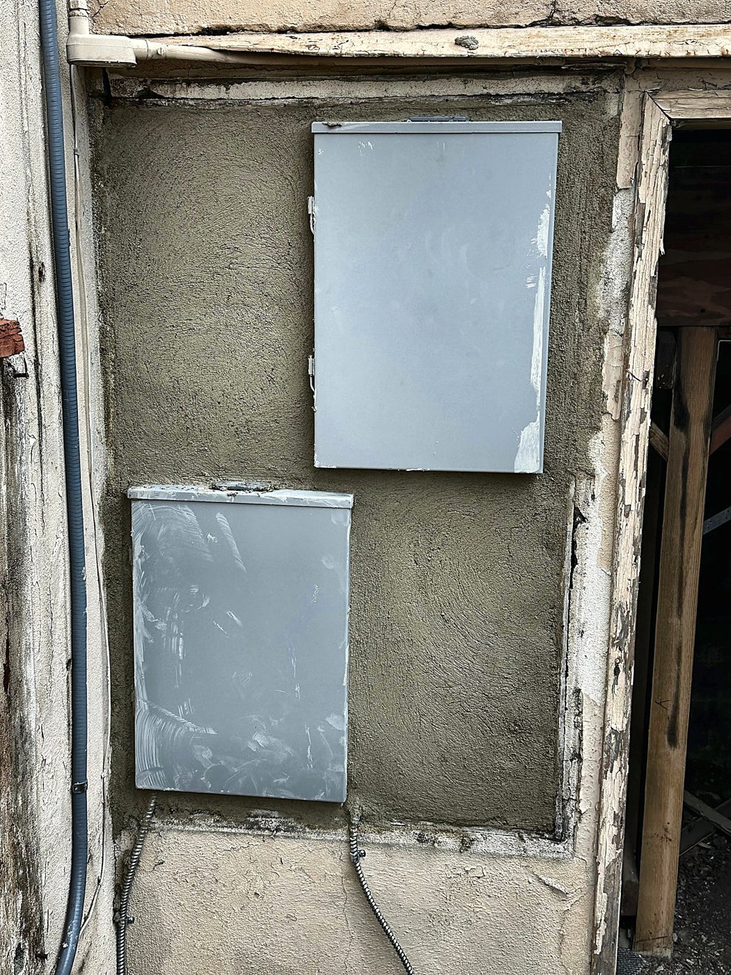 Scratch coat applied around stairwell panels