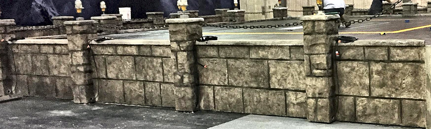Cut-stone wall with pillars