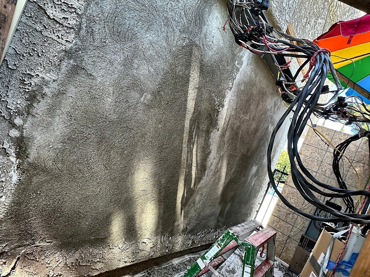 Stucco wall with brown coat