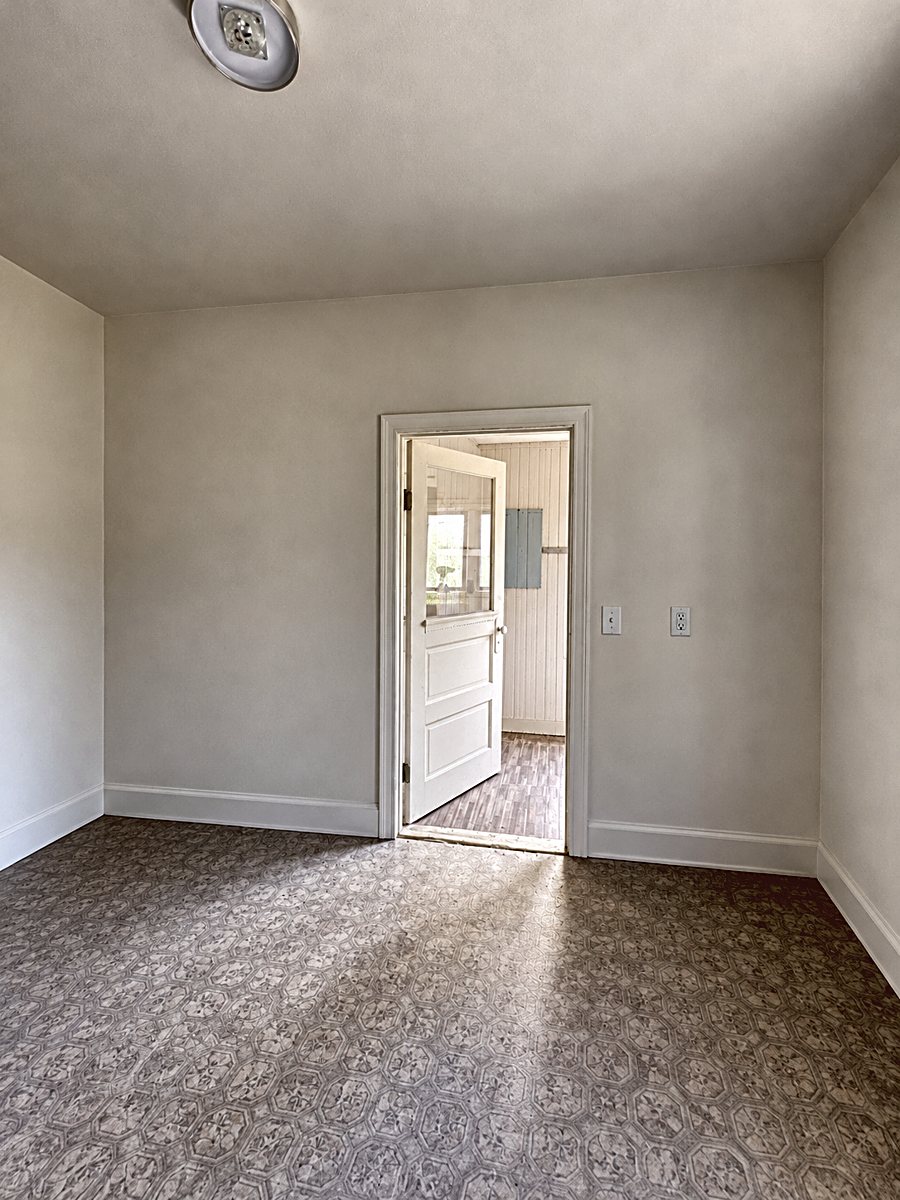 Room 2: finished drywall walls with paint and trim