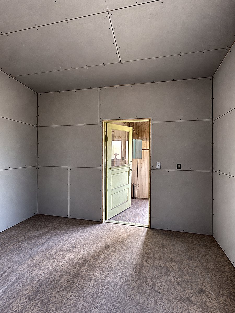 Room 2: installed drywall panels with taped seams