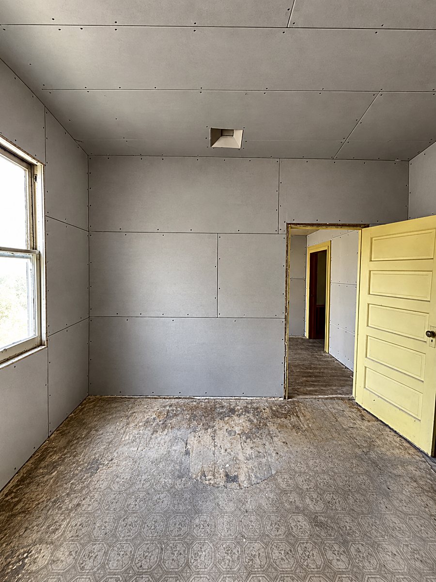 Room 6: installed drywall panels with taped seams